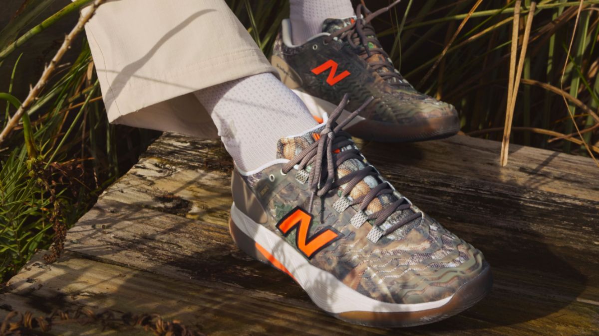 Giay New Balance CT-Rally v2 Outdoor Court Tommy Paul PE voi hoa tiet Realtree camouflage va chi tiet Blaze Orange